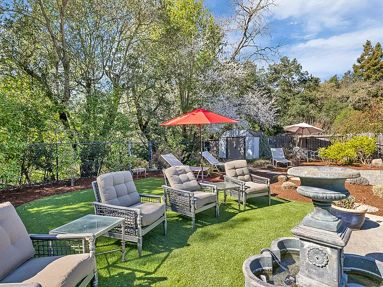 Old photo with outdoor furniture.