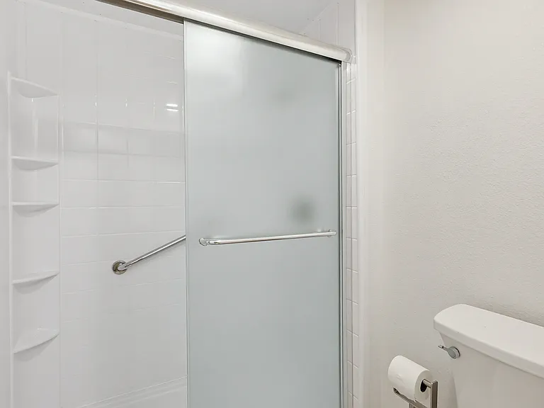 Primary bedroom walk in shower