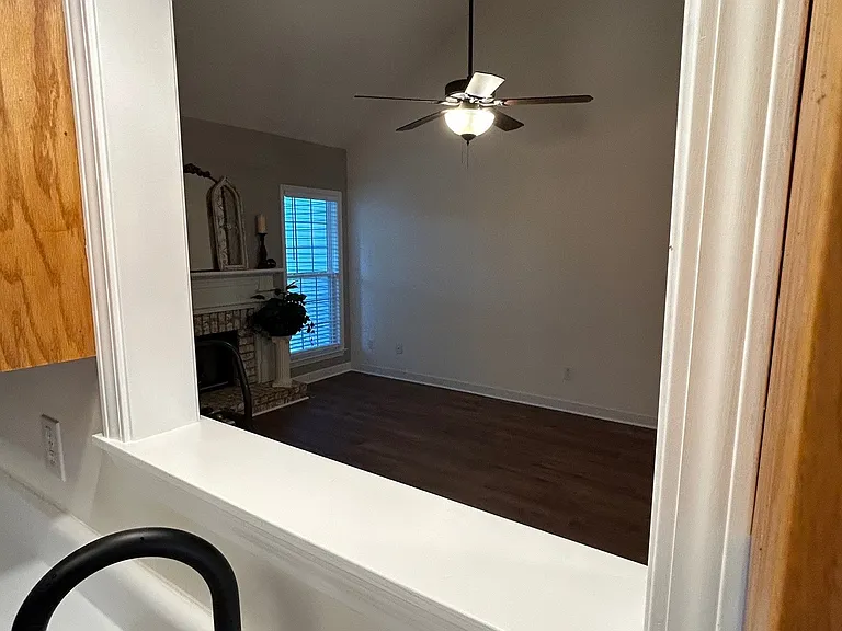 Pass-through window from kitchen to living room