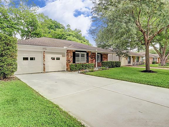 Wonderful double wide driveway and 2 car garage.