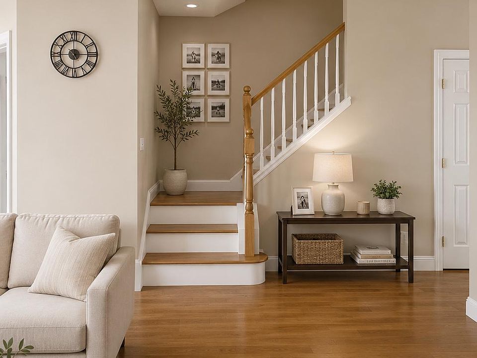 Living room and stairs leading to bedrooms