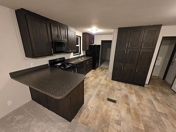 2nd image of 401 N Timberline Rd Lot 5