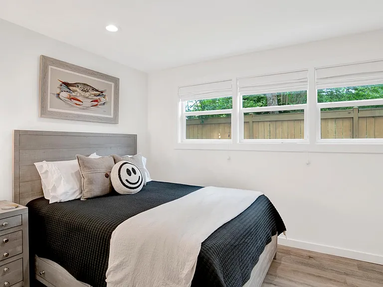 Queen bed and storage on end for clothes and enclose closet.