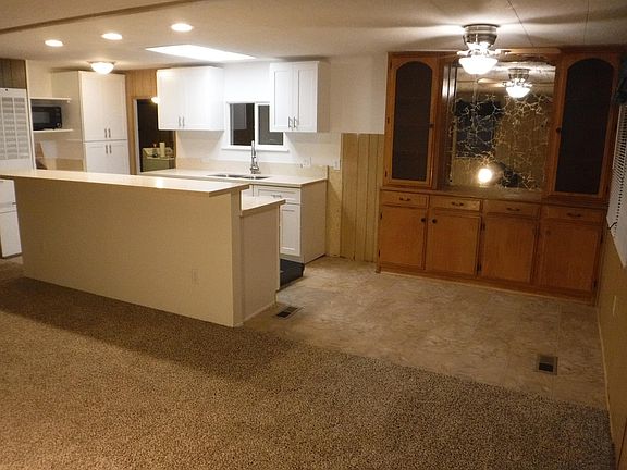 Open Living room, dining room with built-in display cabinet