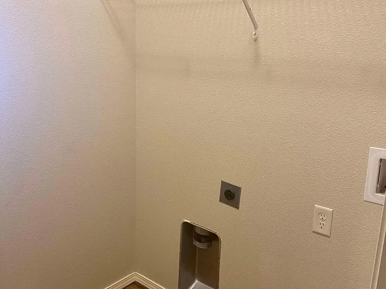 Laundry area with washer/dryer connections.