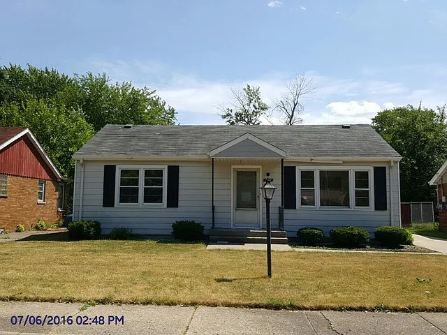 729 E 155th Pl photo 1