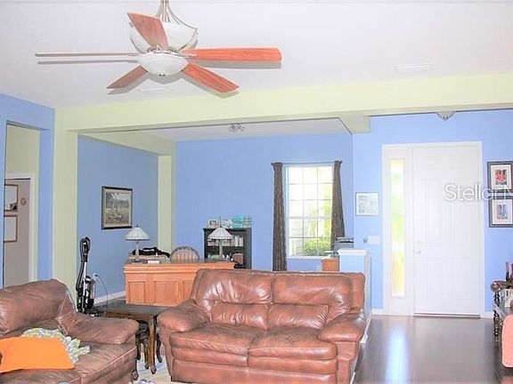 Great room with engineered wood flooring.