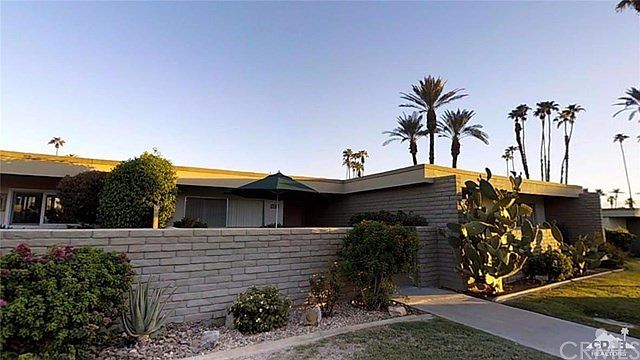 Front entrance with a spacious patio.