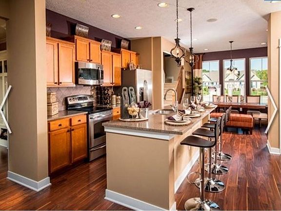 This photo is a model home photo or artist rendering due to construction stage.