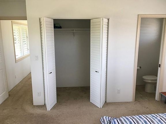 Master bedroom closet and 1/2 bath.