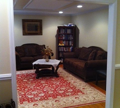 Formal living room with beautiful hardwood floors,