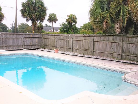 Fenced Underground Pool in Fenced Side yard