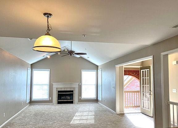Cathedral Ceilings, gas fireplace and intimate porch off living area