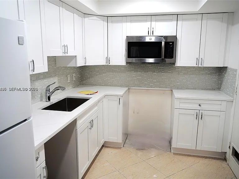 400 Kings Point Dr #320 — Photo 9