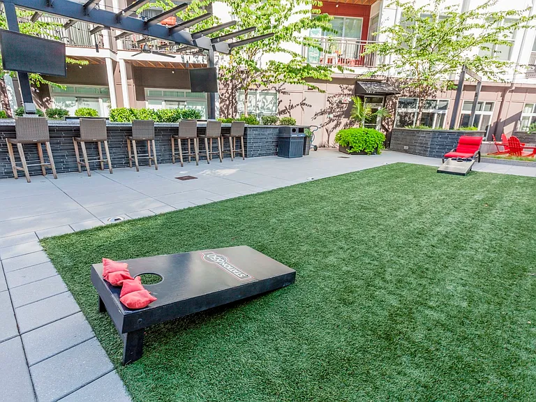 Relax or entertain in our beautifully landscaped outdoor courtyard, featuring premium grilling stations.