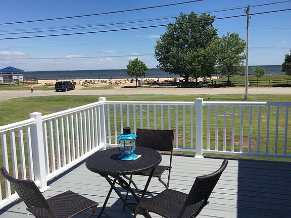 Private Deck with Lounge Chairs overlooking the beach and ba
