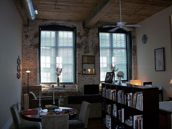 Generous dining area. Bookshelf is included in sale - what a great way to separate the space!