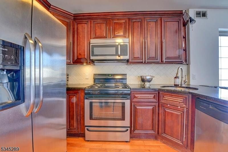 1st image of 100 Leonard St APT 1L