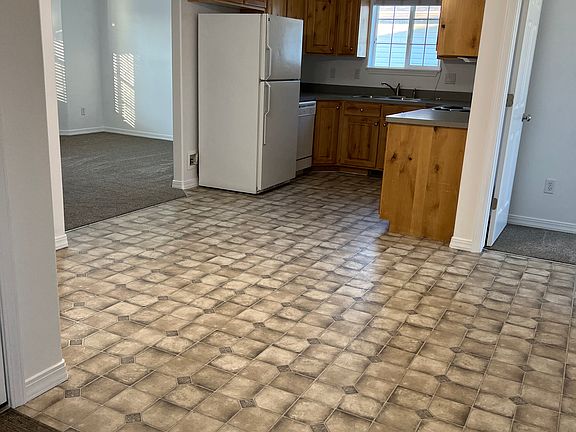 The kitchen and dining area. A table that seats six can fit in this area.