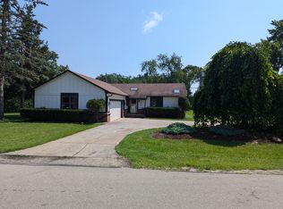 2202 Woodlawn St, Wolverine Lake, MI 48390