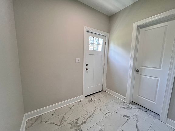 mud room and back door tiled bathroom