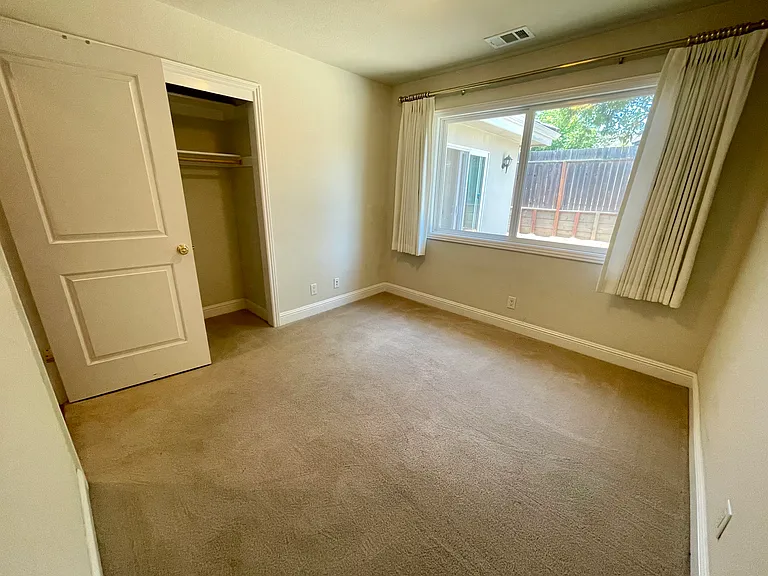 Bedroom 1-Charming, tranquil bedroom offering views of the rear garden.