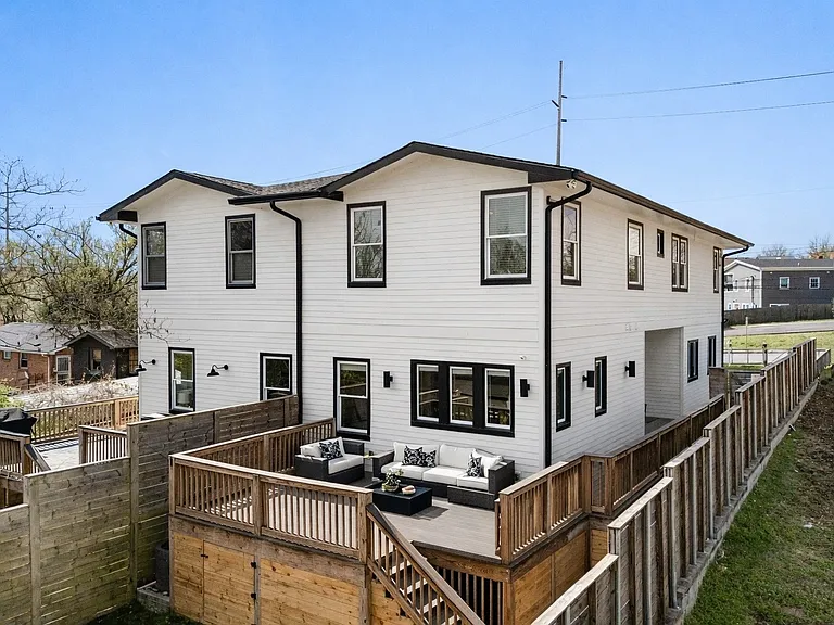 Large rear deck perfect for outdoor dining and entertaining.
