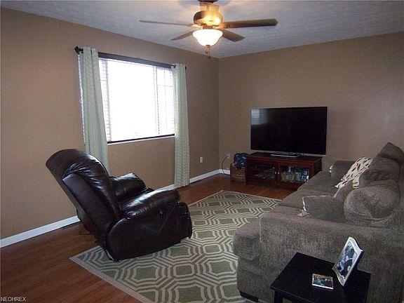 The living room has good  light from a picture window.....