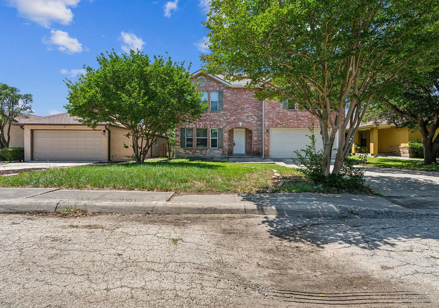 Spacious 4-Bedroom Home with Open Floor Plan & Brick Fireplace — Photo 1