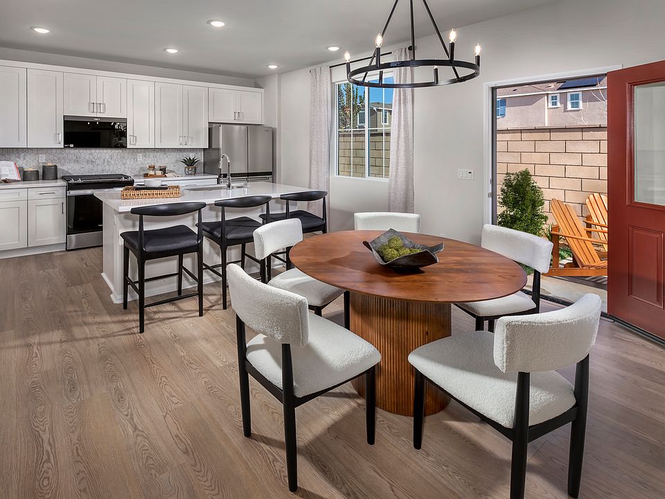 Dining room in the 3218 floorplan at a Meritage Homes community in Temecula, CA.