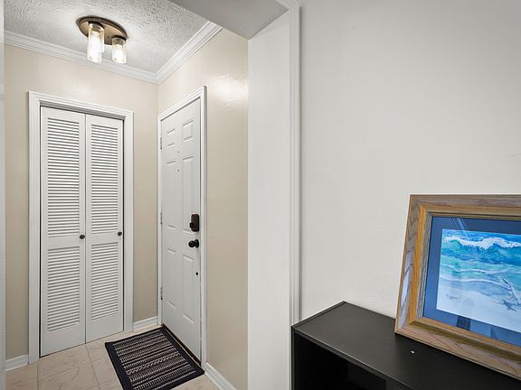 Entrance includes a hall closet for jackets and shoes.