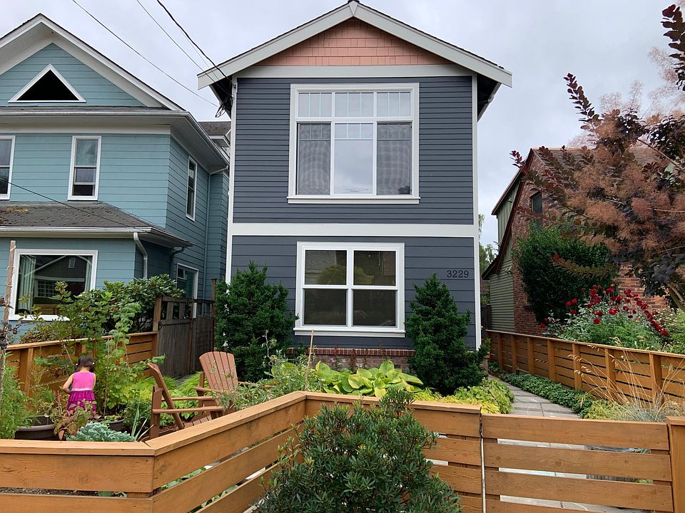 Front of home. The 1st floor windows are yours! Easy street parking available right in this spot.