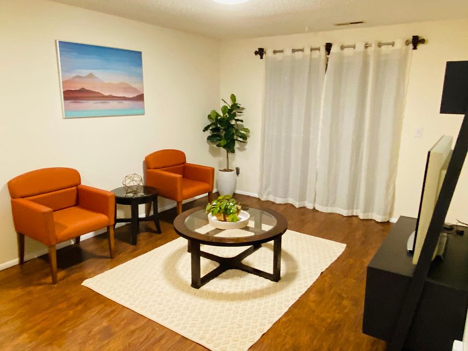 Family Room with Sliding Door Facing the Large Backyard