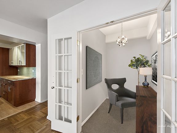 4th image of 40 E 9th St APT 4H