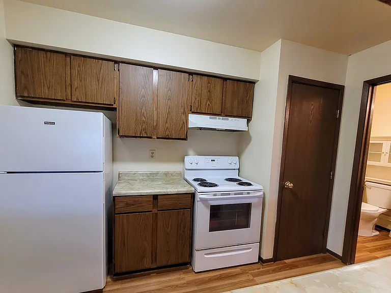 Just off of the kitchen is the half bathroom.