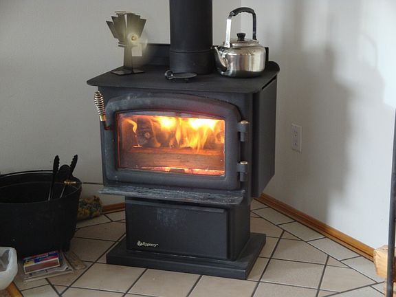 Wood stove heats living area