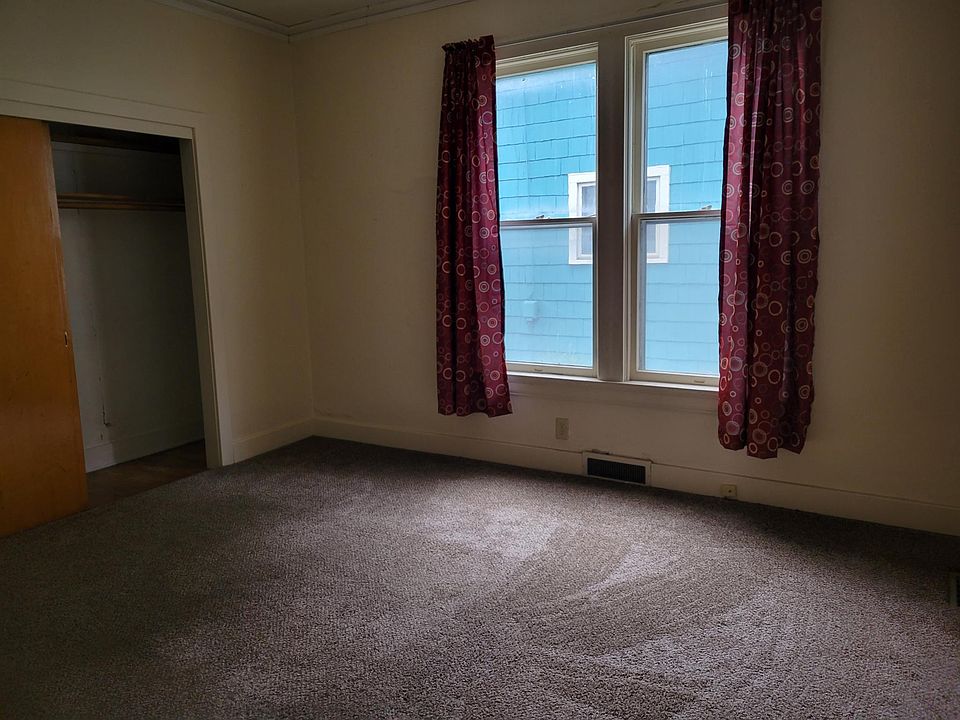 2 large closets on each end of a large bedroom. Lots of natural light