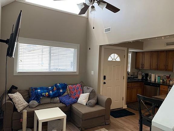 Unit 4 living room with high ceiling