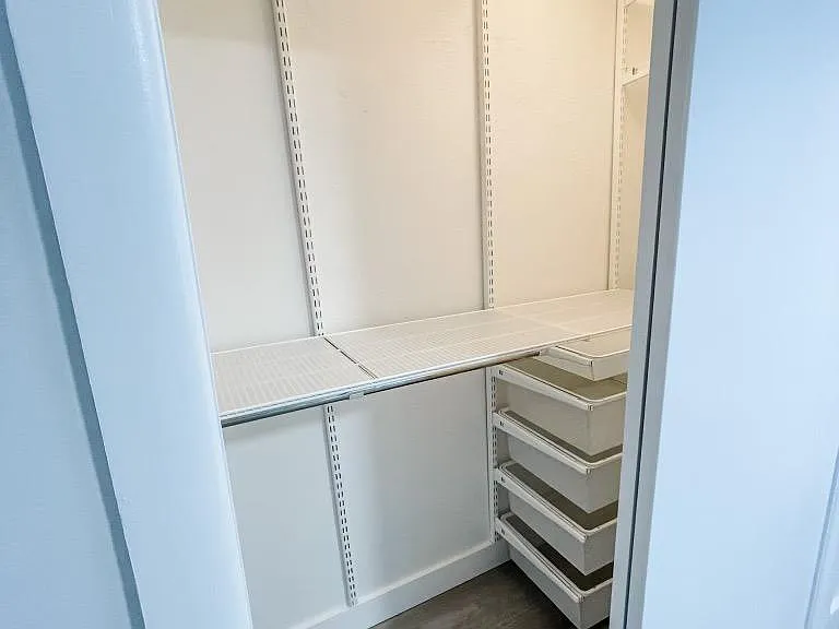 California custom closet installed in main bedroom.