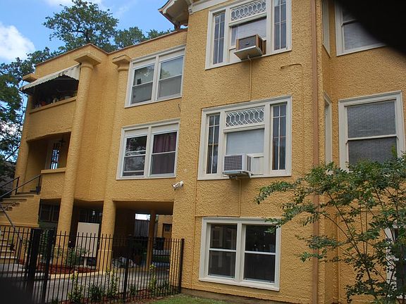 Side View of Building Showing Bedroom Windows of Unit