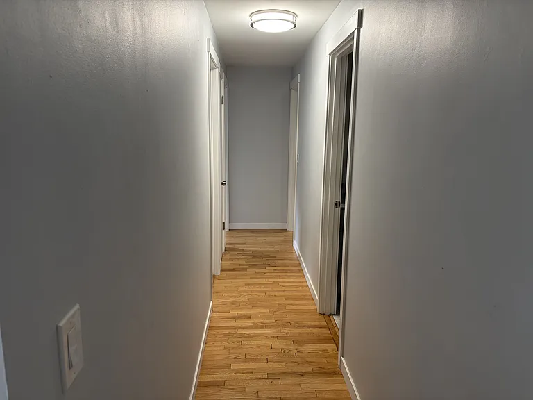 Hallway to bedrooms and bathroom