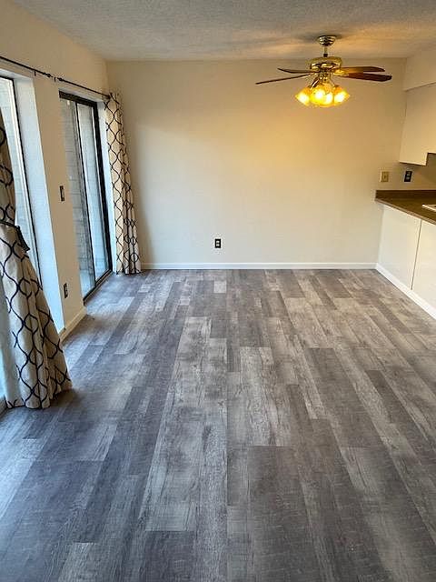 Large windows for lots of light and easy sliding door access to patio.