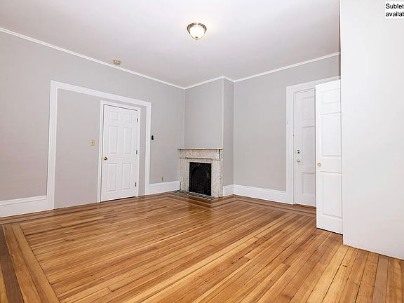 Bedroom (cont.). Has fireplace (door on left leads to living room).