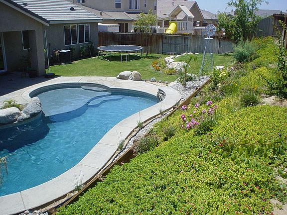 The pool has cascades and a salt chlorinator system!