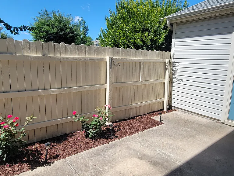 Patio with outdoor storage shed