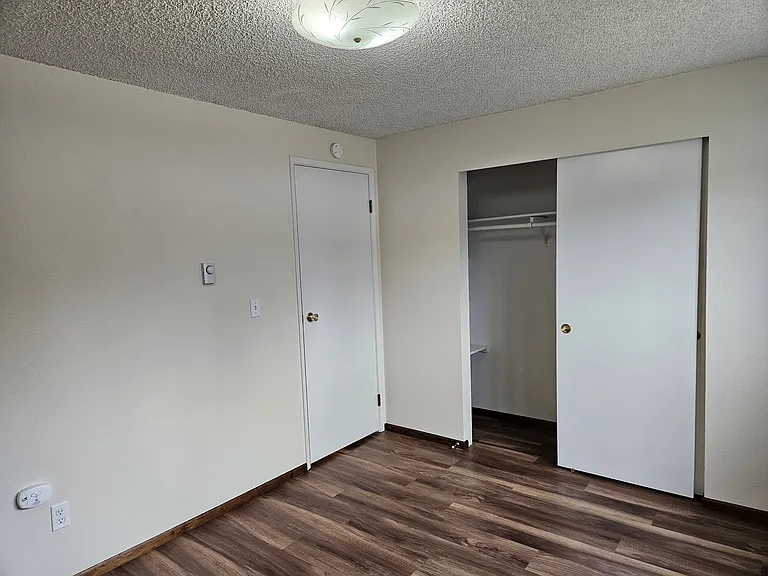 2nd floor W bedroom looking SE showing closet