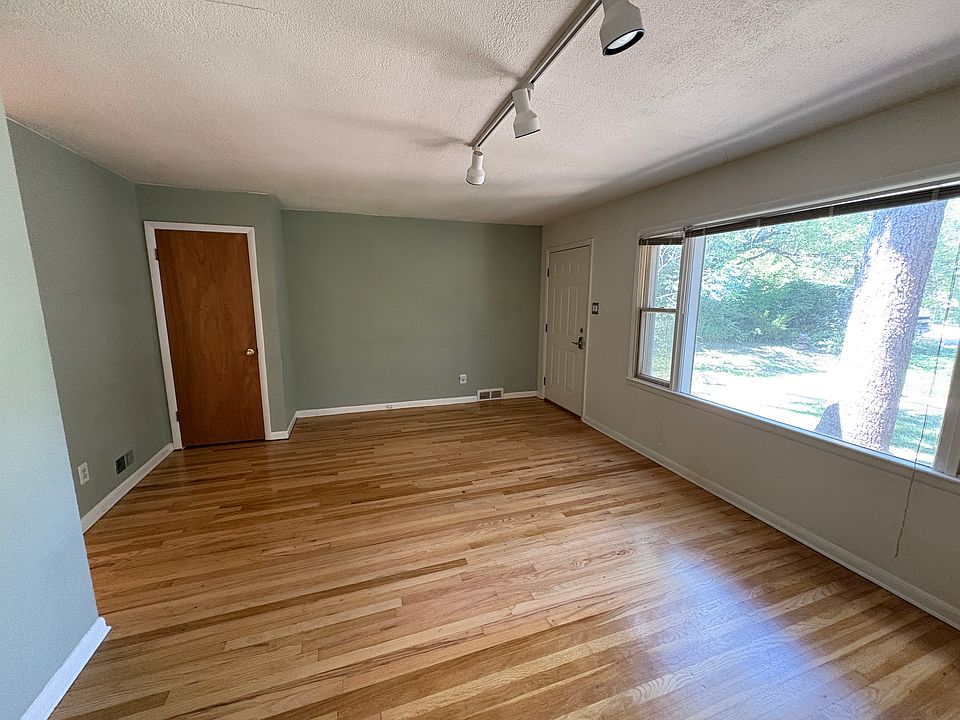 Living Room with beautiful hardwood floors and plentiful natural light