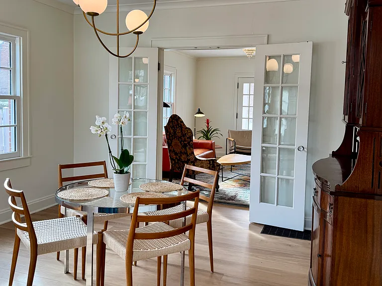 Dining area with French doors leading to living area