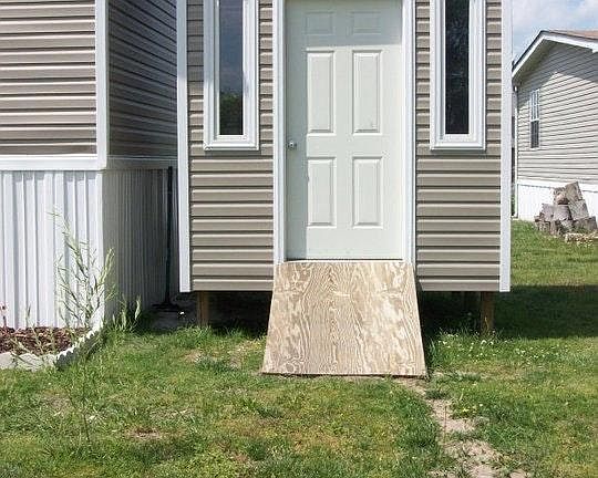 Shed to the right side of home.