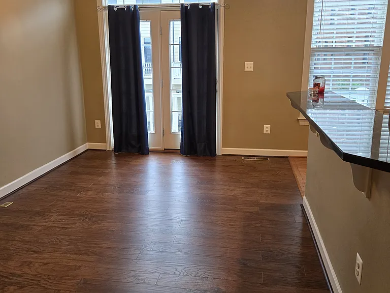 French doors to Balcony and Dining Room